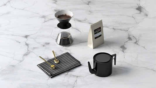 a coffee cup and a lighter on a table